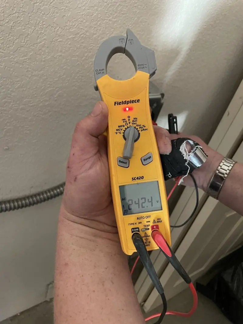 Voltage testing with clamp meter during Aluminum Wiring Replacement in Windsor Heights